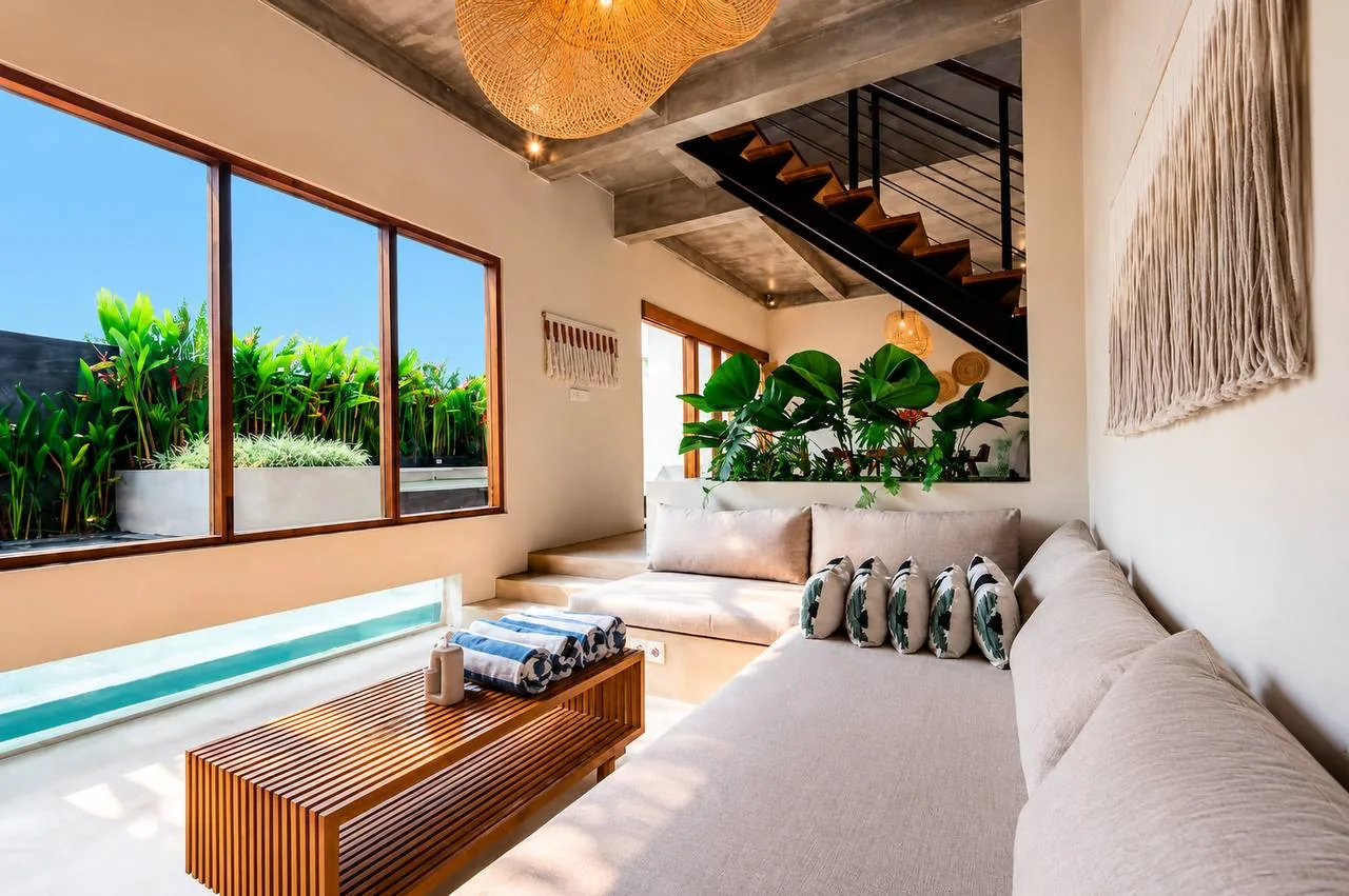 Living room with pool window view